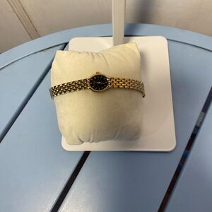 Caravelle by Bulova Women’s Black Dial Gone Tone New Battery